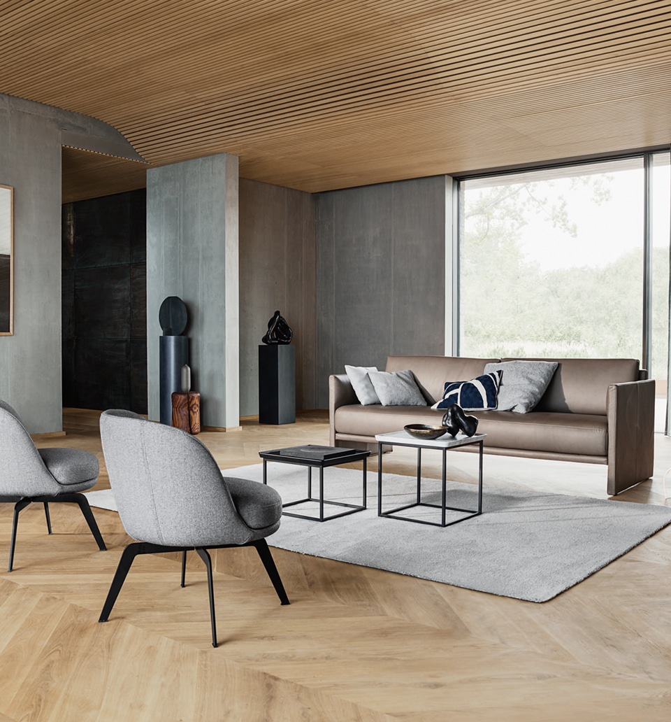 Modern eingerichtetes Wohnzimmer für den digitalen Markenauftritt von Rolf Benz