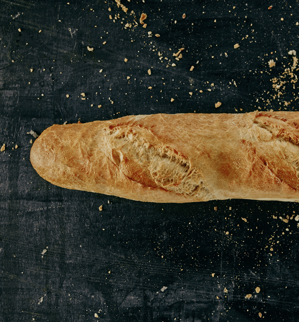 Ein Baguette auf schwarzem Hintergrund für den Markenrelaunch der Bäckerei Ruetz